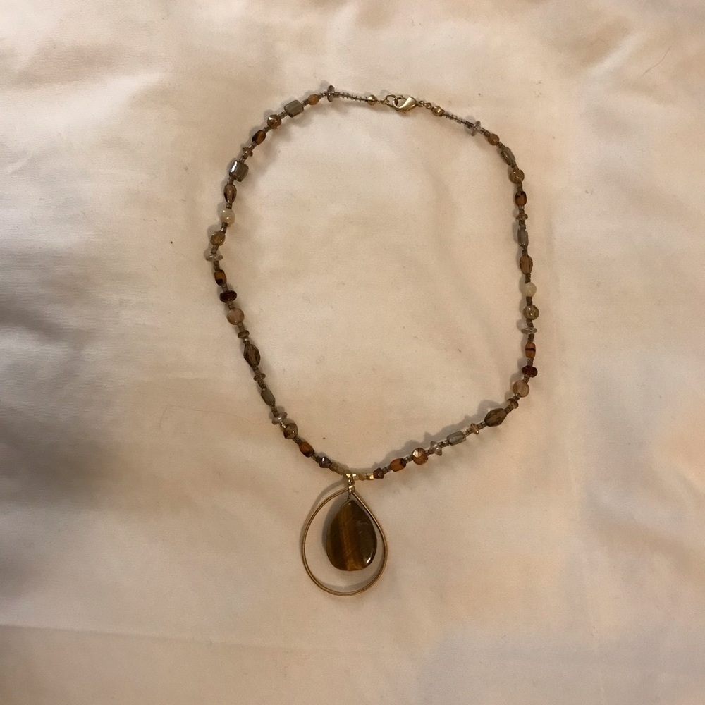Necklace in brown and gold tones
